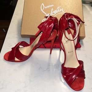 Sexy red strappy sandal with 100s heel, ready to be dressed up or dressed down.